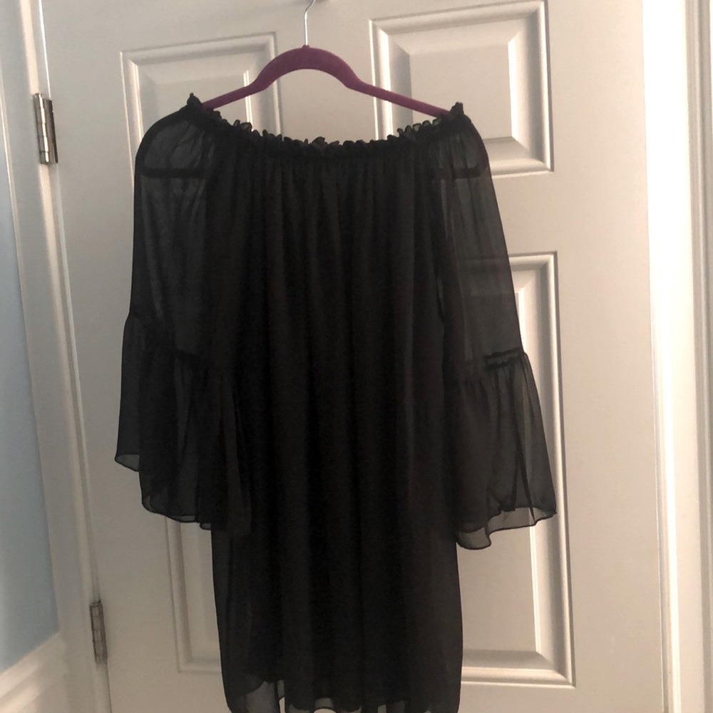 Off the shoulder XXL blouse with sheer sleeves and a lined bodice.